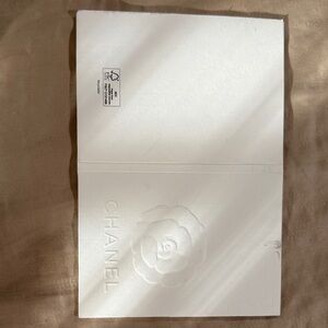 CHANEL White Embossed Camellia receipt holder
